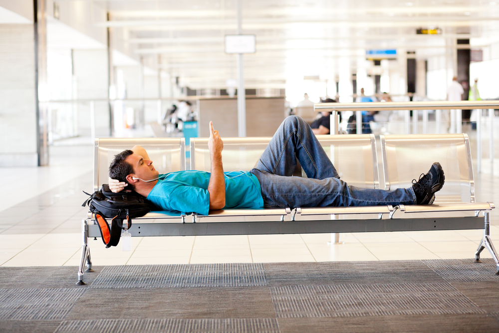 Body-guy-relaxing-in-airport